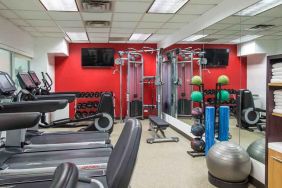 Fitness center with treadmills and machines at the Hilton Chicago-Northbrook.