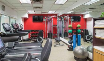 Fitness center with treadmills and machines at the Hilton Chicago-Northbrook.