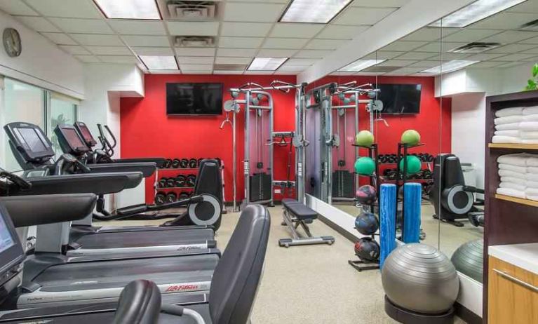 Fitness center with treadmills and machines at the Hilton Chicago-Northbrook.