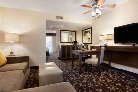 Living room in a hotel suite perfect as workspace at the Embassy Suites by Hilton Napa Valley.