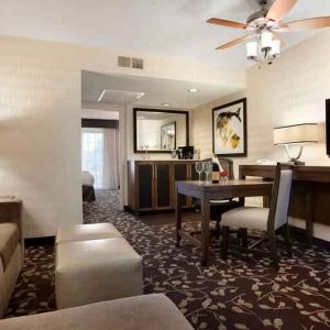 Living room in a hotel suite perfect as workspace at the Embassy Suites by Hilton Napa Valley.