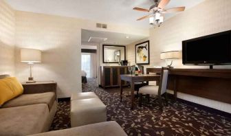 Living room in a hotel suite perfect as workspace at the Embassy Suites by Hilton Napa Valley.