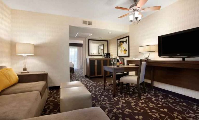 Living room in a hotel suite perfect as workspace at the Embassy Suites by Hilton Napa Valley.