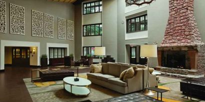 Beatiful lobby workspace by the fireplace at the Embassy Suites by Hilton Napa Valley.