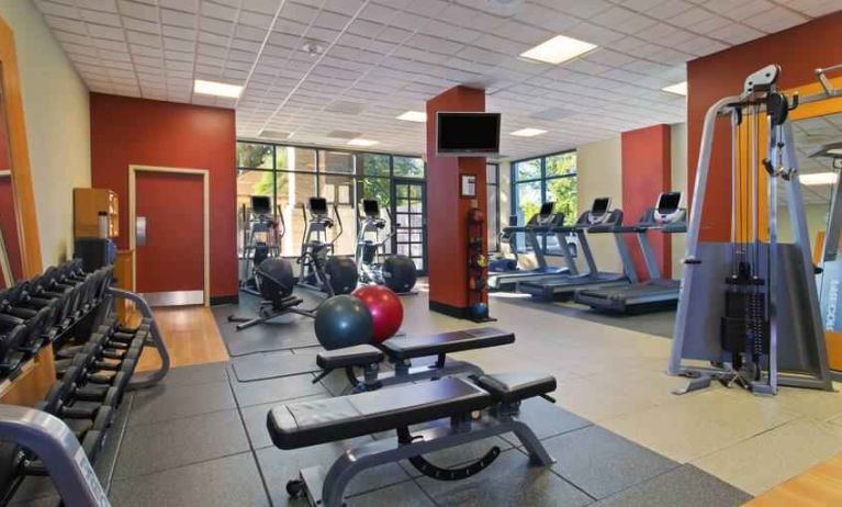 Fully equipped fitness center at the Hilton New Orleans Airport.