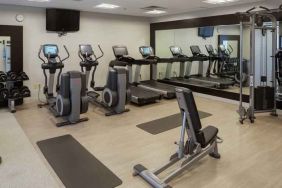 Fitness center with treadmills and machines at the Hilton Birmingham at UAB.