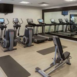 Fitness center with treadmills and machines at the Hilton Birmingham at UAB.