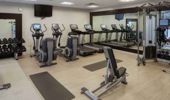 Fitness center with treadmills and machines at the Hilton Birmingham at UAB.