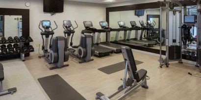 Fitness center with treadmills and machines at the Hilton Birmingham at UAB.