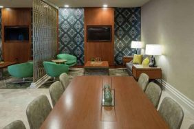 Comfortable hotel workspace with tables and lounges at the Hilton Birmingham at UAB.