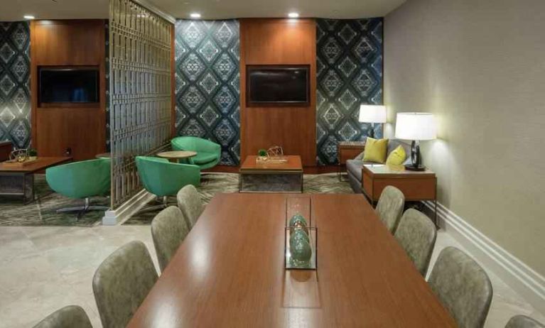 Comfortable hotel workspace with tables and lounges at the Hilton Birmingham at UAB.