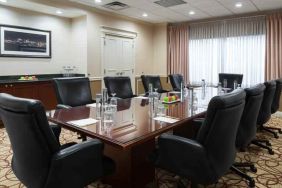 Elegant meeting room with comfortable chairs at the DoubleTree Suites by Hilton Cincinnati-Blue Ash.