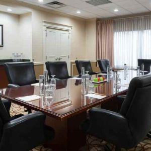 Elegant meeting room with comfortable chairs at the DoubleTree Suites by Hilton Cincinnati-Blue Ash.