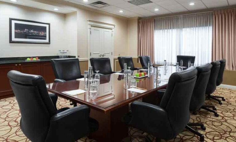 Elegant meeting room with comfortable chairs at the DoubleTree Suites by Hilton Cincinnati-Blue Ash.