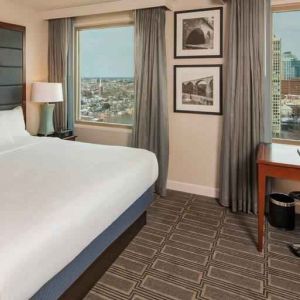 King-bedroom with desk at the Hilton Philadelphia at Penn's Landing.