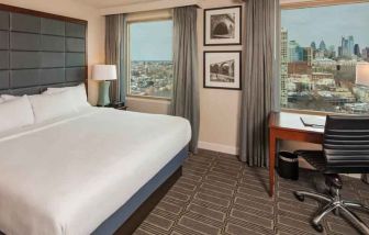 King-bedroom with desk at the Hilton Philadelphia at Penn's Landing.