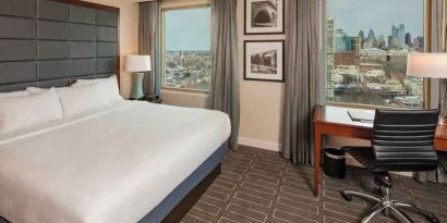 King-bedroom with desk at the Hilton Philadelphia at Penn's Landing.