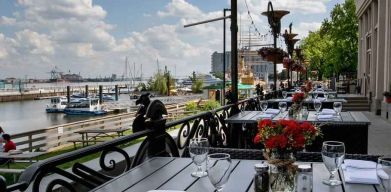 Beautiful outodoor terrace by the water perfect for co-working at the Hilton Philadelphia at Penn's Landing.