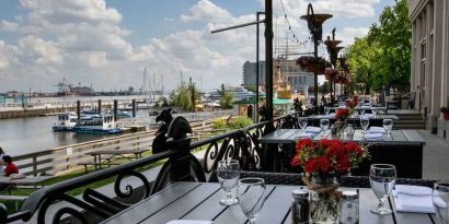 Beautiful outodoor terrace by the water perfect for co-working at the Hilton Philadelphia at Penn's Landing.