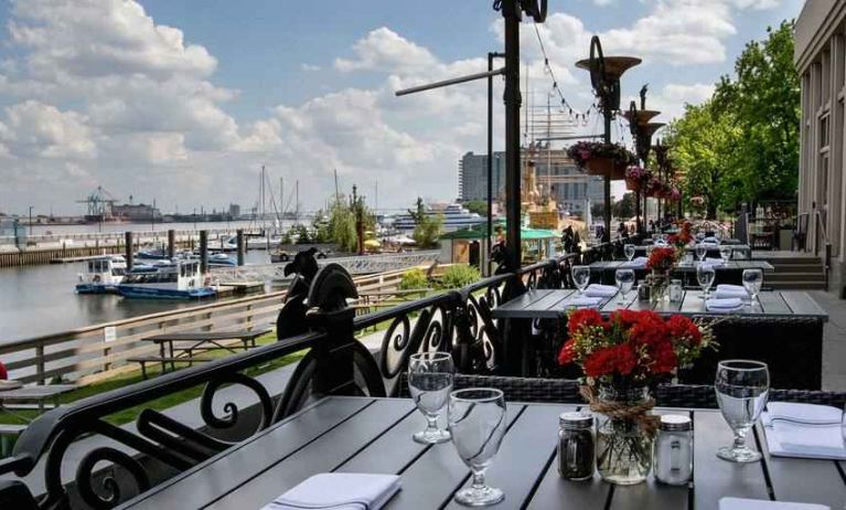 Beautiful outodoor terrace by the water perfect for co-working at the Hilton Philadelphia at Penn's Landing.