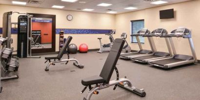 Fully equipped fitness center at the Hampton Inn & Suites St. Paul Oakdale/Woodbury by Hilton.