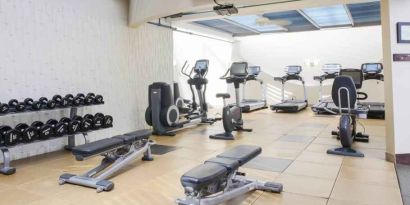 Fully equipped fitness center at the DoubleTree by Hilton Rochester.