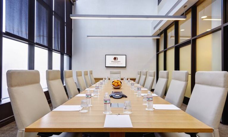 Small meeting room with TV screen at the DoubleTree by Hilton Washington DC - Crystal City.