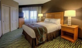 Queen suite with window at the DoubleTree Suites by Hilton Orlando - Disney Springs Area.