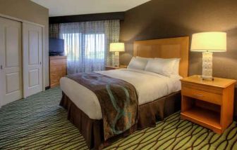 Queen suite with window at the DoubleTree Suites by Hilton Orlando - Disney Springs Area.