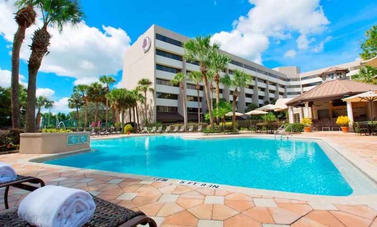 Relaxing outdoor pool at the DoubleTree Suites by Hilton Orlando - Disney Springs Area.