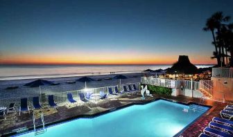 Outdoor pool overlooking the beach at the DoubleTree Beach Resort by Hilton Tampa Bay - North Redingto.