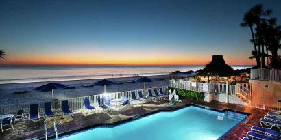 Outdoor pool overlooking the beach at the DoubleTree Beach Resort by Hilton Tampa Bay - North Redingto.