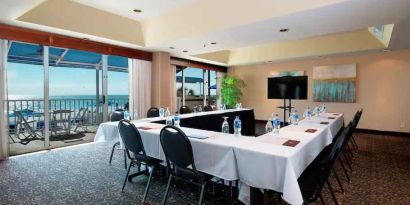 Bright meeting room with u shape table at the DoubleTree Beach Resort by Hilton Tampa Bay - North Redingto.