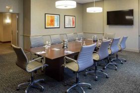 Small meeting room with TV screen at the DoubleTree by Hilton Pittsburgh Green Tree.