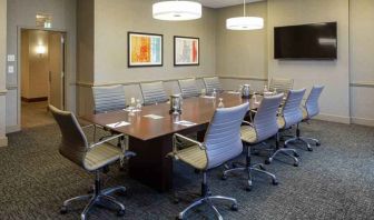 Small meeting room with TV screen at the DoubleTree by Hilton Pittsburgh Green Tree.