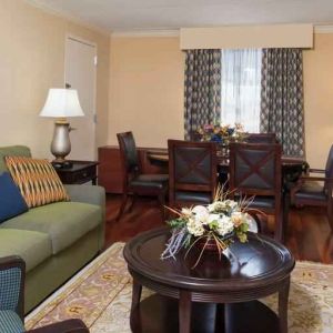 Living room with working station at the DoubleTree by Hilton Grand Rapids Airport.