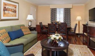 Living room with working station at the DoubleTree by Hilton Grand Rapids Airport.