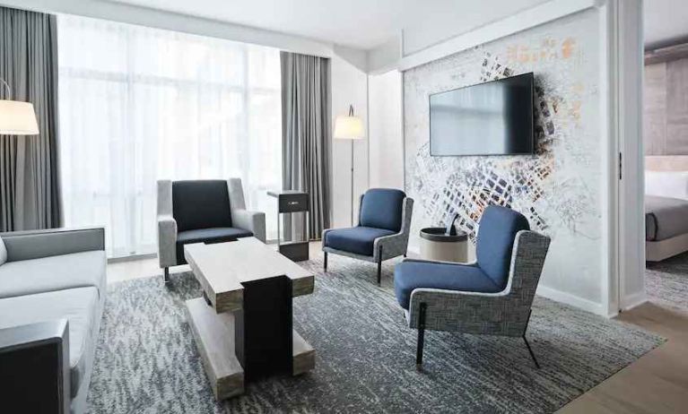 Elegant living room with working station at the Canopy by Hilton Washington DC The Wharf.