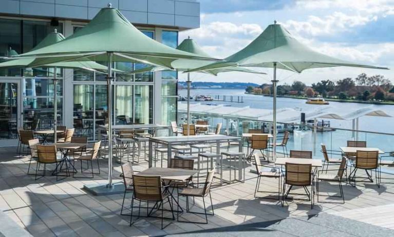 Outdoor workspace overlooking the wharf at the Canopy by Hilton Washington DC The Wharf.