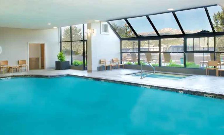 Relaxing indoor pool at the Embassy Suites by Hilton Colorado Springs.