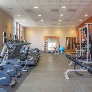 Fitness center with treadmills and machines at the Hilton Reading.