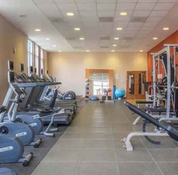 Fitness center with treadmills and machines at the Hilton Reading.