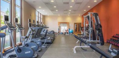 Fitness center with treadmills and machines at the Hilton Reading.