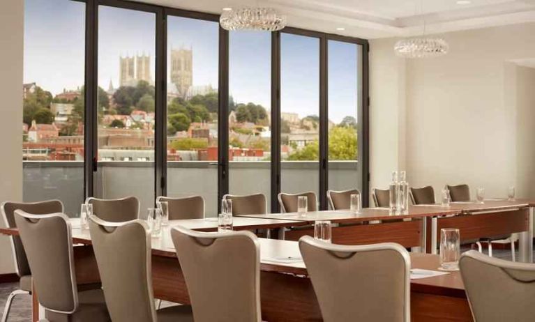 Bright meeting room with u shape table at the DoubleTree by Hilton Lincoln.