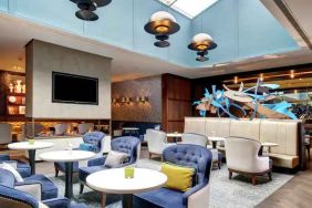 Spacious lobby workspace with lounges, chairs and tables at the Hilton London Bankside.