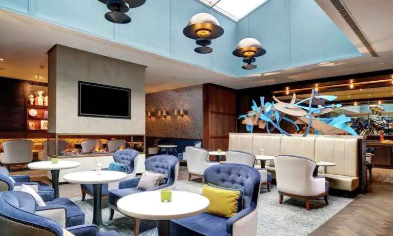 Spacious lobby workspace with lounges, chairs and tables at the Hilton London Bankside.