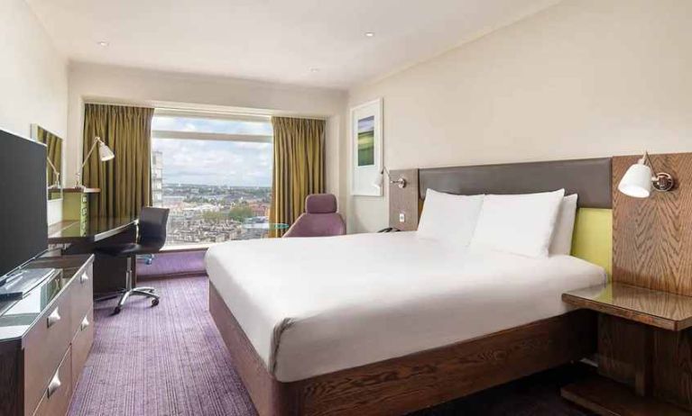 spacious king room with lots of natural light at Hilton London Metropole.