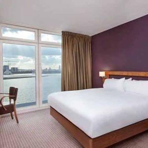 beautiful delux king room with TV and work area at DoubleTree by Hilton London ExCel.