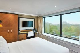 King guestroom with window and desk at the DoubleTree by Hilton London - Hyde Park.