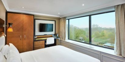 King guestroom with window and desk at the DoubleTree by Hilton London - Hyde Park.